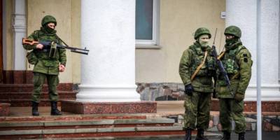 Рашисты заблокировали работу гумцентра в Бердянске и взяли в заложники людей