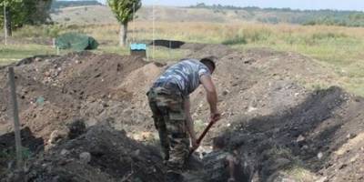 На Запорожье рашисты массово роют окопы
