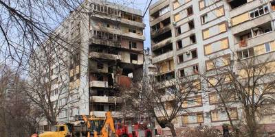 У Запоріжжі продовжується ліквідація наслідків ракетного удару по  багатоповерхівкам (фото)