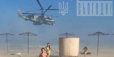 В окупованому Приморську рашисти на гвинтокрилах лякають відпочиваючих на пляжі