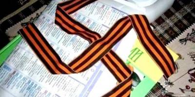 Окупанти погрожують бердянцям в’язницею за псування георгіївської стрічки