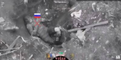 На Запоріжжі під Роботино поранений окупант зарізав себе ножем (відео)